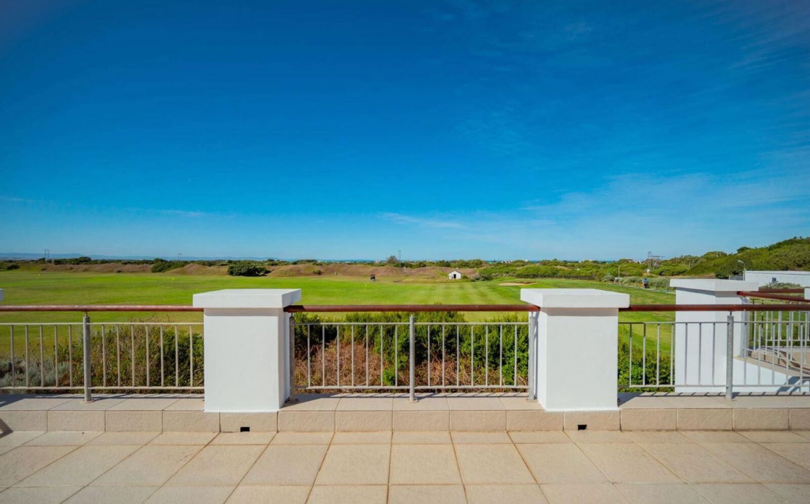 View from Wildehaven's terrace across the fairway to the dunes